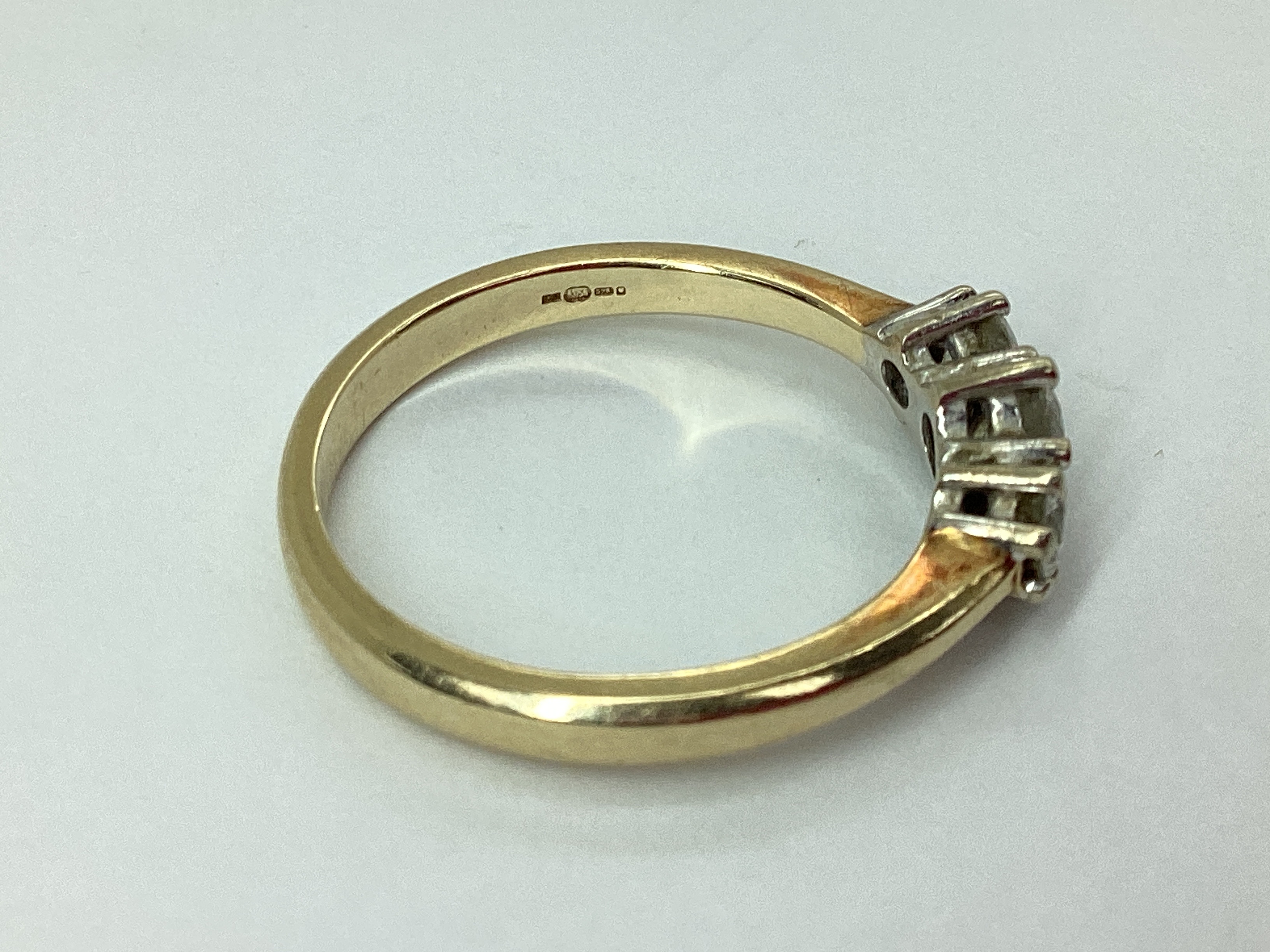 Lot 30 - A 9ct Gold Three Stone Diamond Ring, of