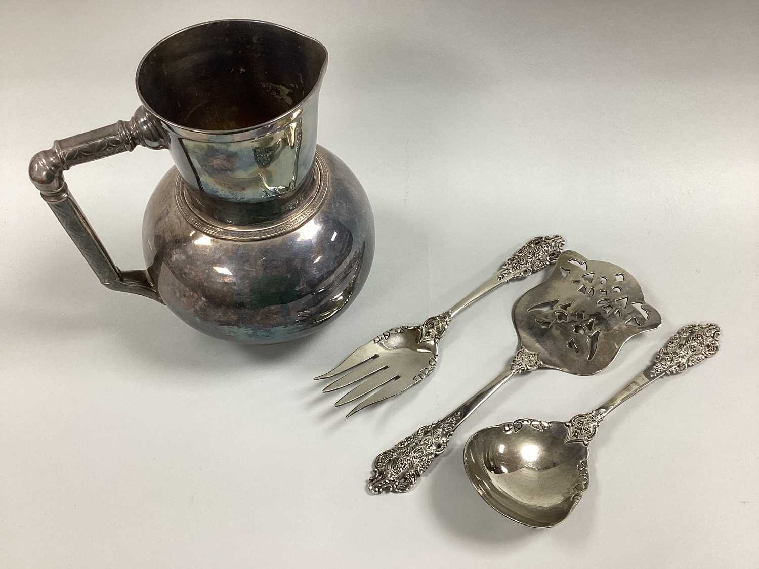 Lot 29 - An Elkington & Co Plated Jug, (16587) designed...