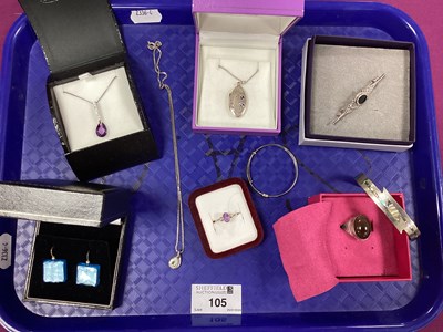 Lot 105 - A Hallmarked Silver Cabochon Stone Set Ring,...