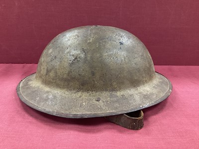 Lot 764 - WWI British Army Brodie Mk I steel helmet with...