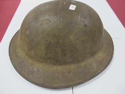 Lot 764 - WWI British Army Brodie Mk I steel helmet with...