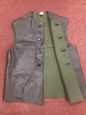 Lot 729 - Post-war British Army unissued PVC jerkin with...