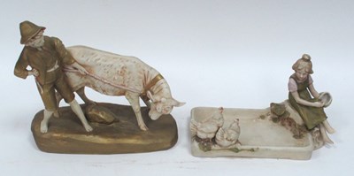 Lot 1092 - A Royal Dux Pottery Figure, modelled as a girl...