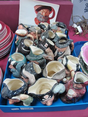 Lot 1147 - A collection of Royal Doulton Toby jugs -...