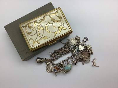 Lot 147 - A Curb Link Charm Bracelet, to heart shape...