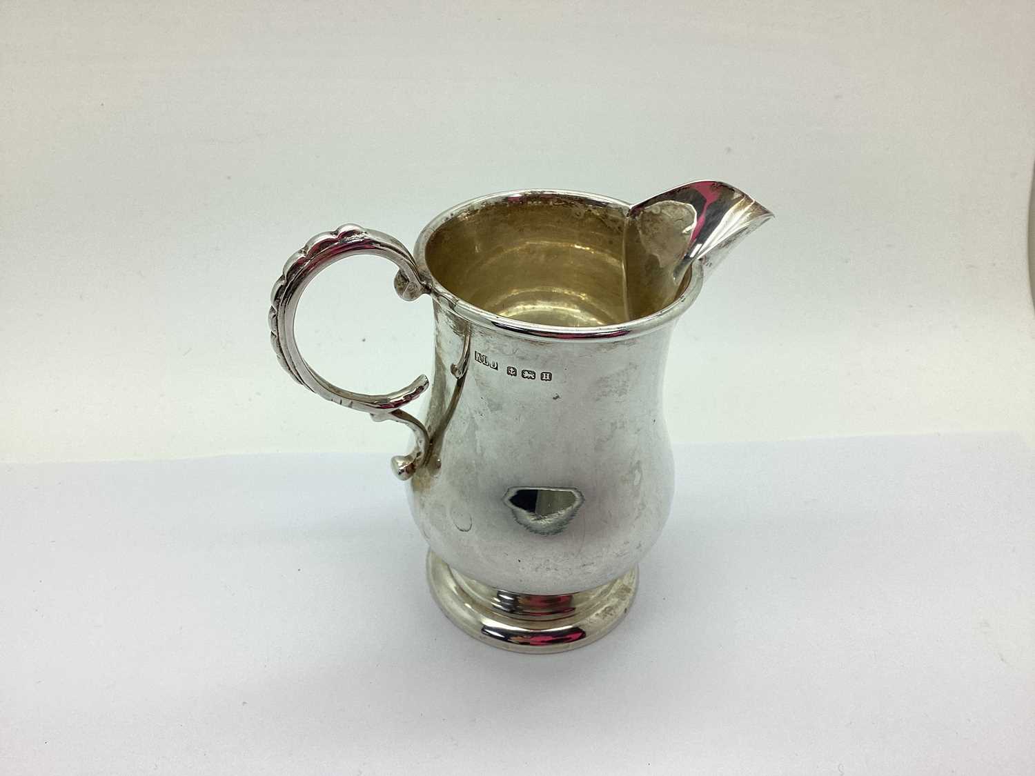 Lot 86 - A Hallmarked Silver Jug, ALD, Birmingham 1932,...