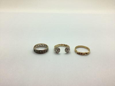 Lot 207 - A Modern 9ct Gold Ring, of twisted design with...