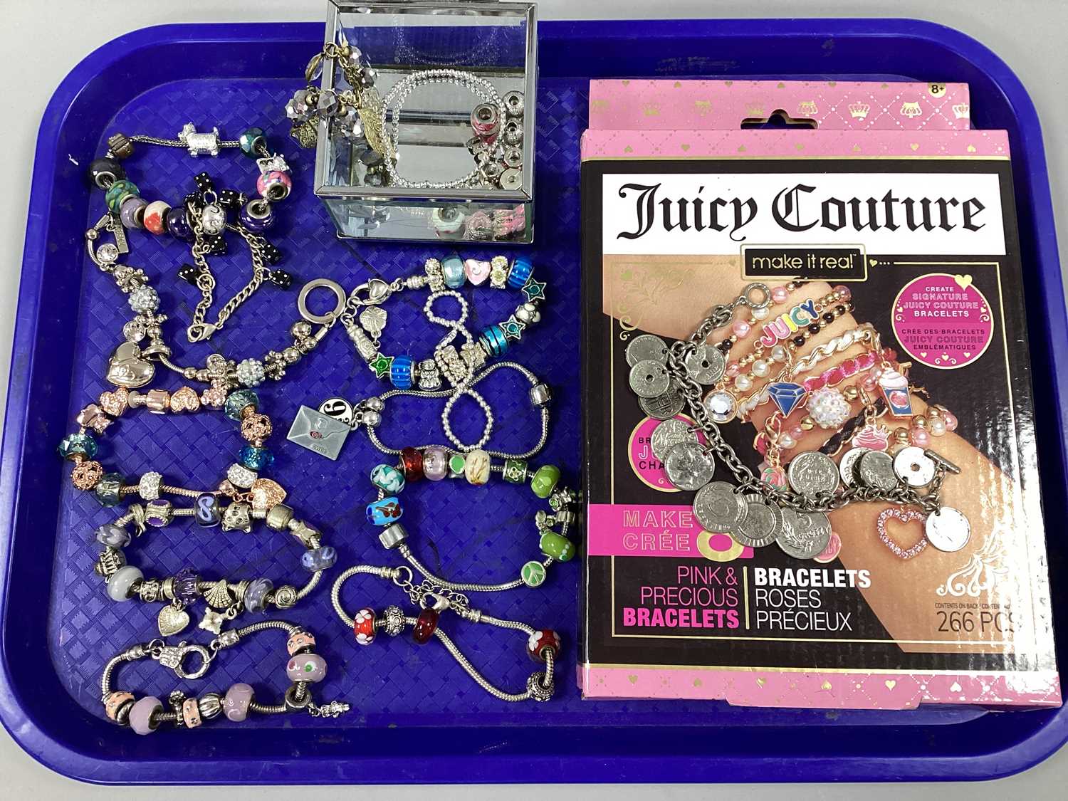 Lot 3 - A Collection of Modern Sliding Charm Style...
