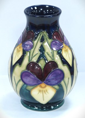 Lot 1261 - A Moorcroft vase decorated in the 'Heartsease'...