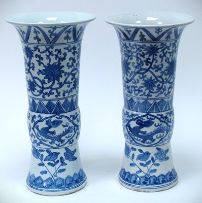 Lot 1355 - A pair of Chinese blue and white cylindrical...