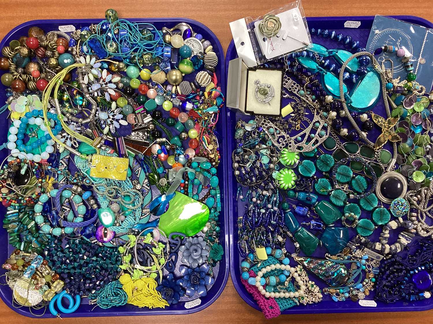 Lot 36 - A Collection of Costume Jewellery, in hues of...