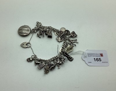 Lot 165 - A Curb Link Charm Bracelet, to a hallmarked...