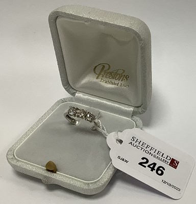 Lot 246 - A Three Stone Diamond Ring, the brilliant cut...
