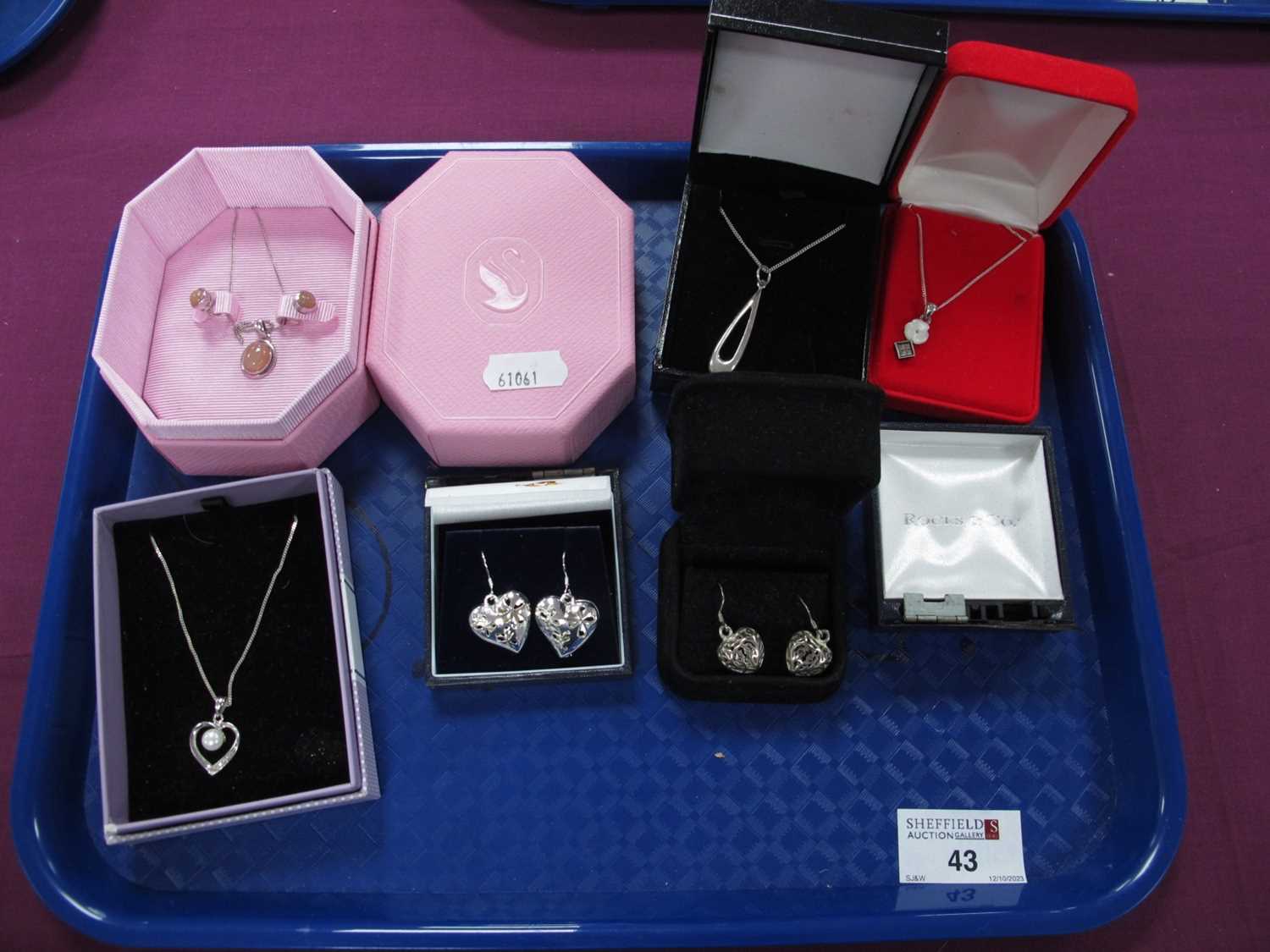 Lot 43 - Modern Pendants on Chains, heart shape drop...