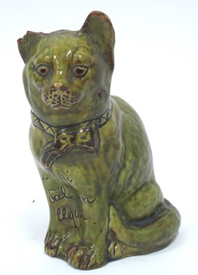 Lot 1082 - A Jones, Bridgend Pottery Green Glazed Model...