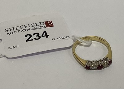 Lot 234 - An 18ct Gold Five Stone Ring, alternately claw...