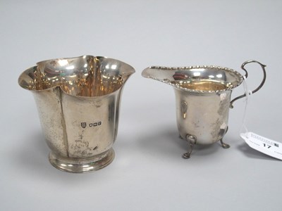 Lot 17 - A Hallmarked Silver Jug, Walker & Hall,...