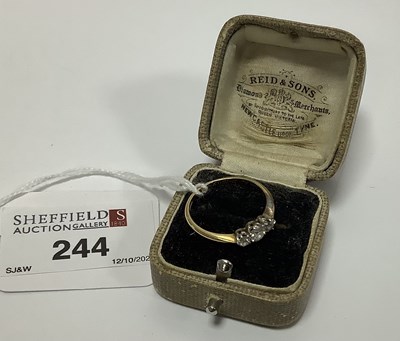 Lot 244 - A Three Stone Diamond Ring, the graduated old...