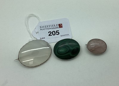 Lot 205 - A Malachite Oval Panel Brooch, collet set;...