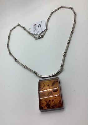 Lot 221 - A Modern Amber Coloured Panel Pendant, on...