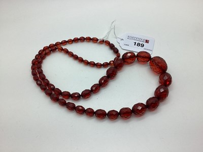 Lot 189 - A Vintage Cherry Amber Coloured Graduated...