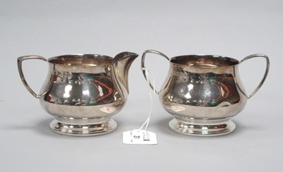 Lot 31 - A Hallmarked Silver Jug and Matching Twin...