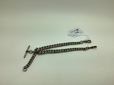 Lot 114 - A Graduated Curb Link Albert Chain, suspending...