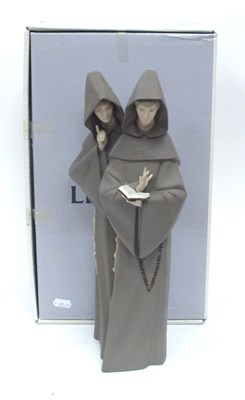 Lot 1075 - A Lladro Figure Group of Monks, in matt finish,...