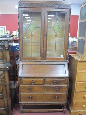 Lot 1550 - 1930s Oak Bureau Bookcase, the top with glazed...