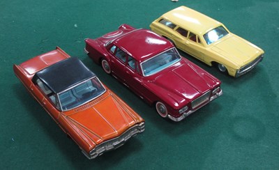 Lot 486 - Three Original Tinplate 'Push 'N' Go Cars, by...