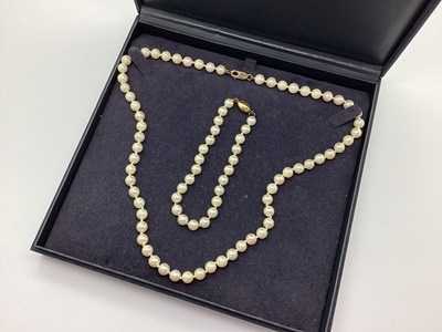 Lot 212 - A Knotted Cultured Pearl Necklace, clasp...