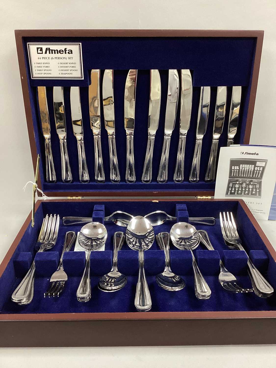 Lot 70 - Amefa; A Fourty Four Piece Stainless Steel...
