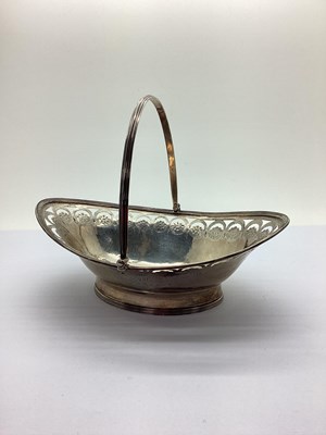 Lot 145 - A Georgian Hallmarked Silver Swing Handled...
