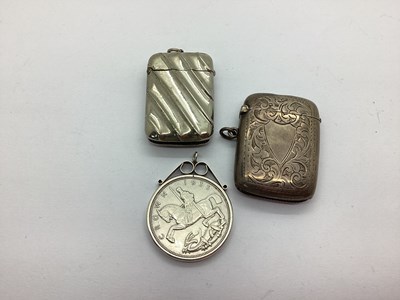 Lot 115 - A Hallmarked Silver Vesta Case, leaf scroll...