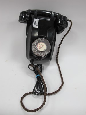 Lot 1369 - A 1959 Black Bakelite Wall Telephone, with...