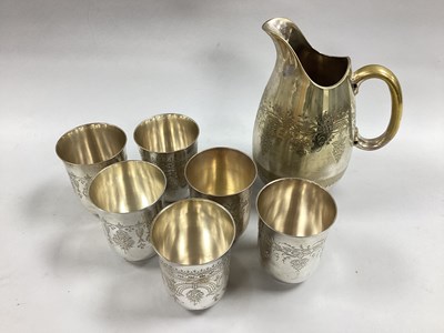 Lot 26 - An EPNS Water Jug, with fruiting vine...