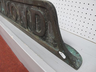 Lot 613 - An early 20th century cast railway sign,...