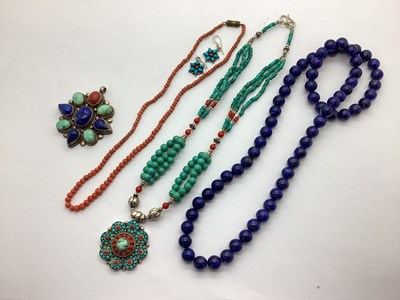 Lot 133 - A Coral Coloured Bead Necklace, of graduated...