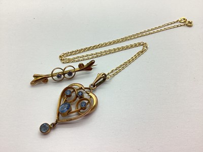 Lot 286 - An Edwardian Openwork Pendant, circular and...