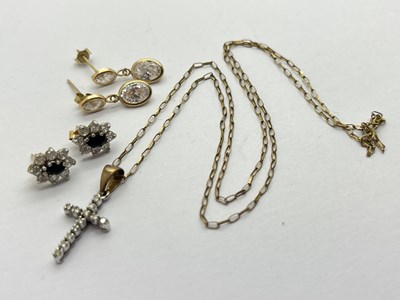 Lot 273 - A 9ct Gold Stone Set Pendant, of cross design,...