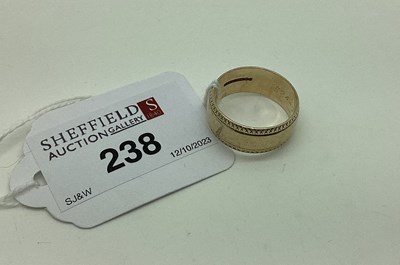 Lot 238 - A 9ct Gold Wide Part Patterned Wedding Band,...