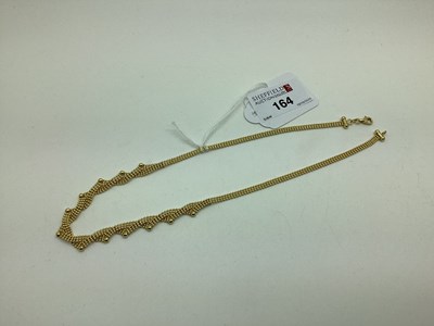 Lot 164 - A Modern 9ct Gold Necklace, of textured shaped...