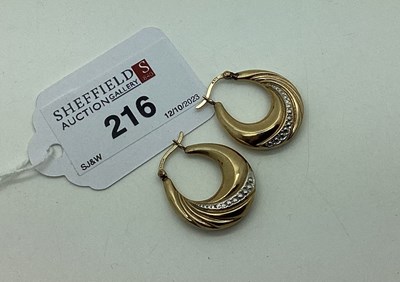 Lot 216 - A Pair of Two Colour Creole Hoop Earrings,...