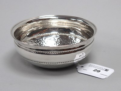 Lot 29 - A Planished Dish, with punch dot detail,...
