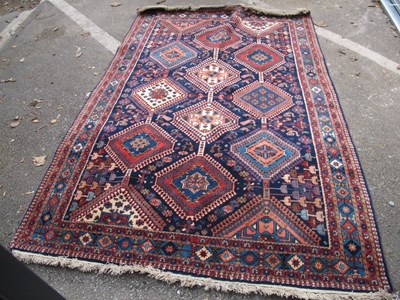 Lot 1592 - An Iranian Yalameh Wool Carpet, the centre...