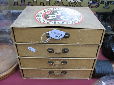 Lot 1347 - A four drawer vintage sewing cabinet for J.P....