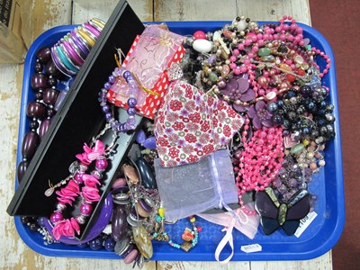Lot 23 - An Assortment of Costume Jewellery, in hues of...