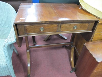 Lot 1570 - XX Century Mahogany Sofa Table, with drop...
