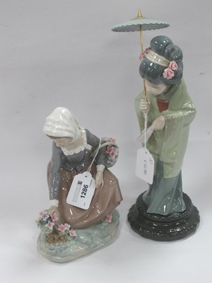Lot 1281 - Two Lladro Figurines - A Japanese Lady holding...
