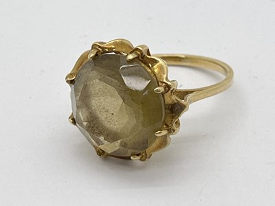 Lot 34 - A 9ct Gold Stone Set Dress Ring, the round...